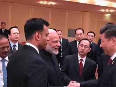 At BRICS, PM Modi and Xi praise each other