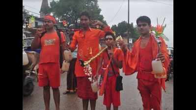 Rain fails to deter the spirit of kanwariyas