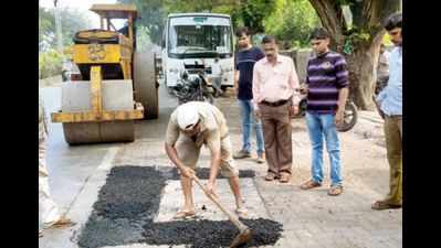 Heat on 281 BMC engineers for neglect during road scam