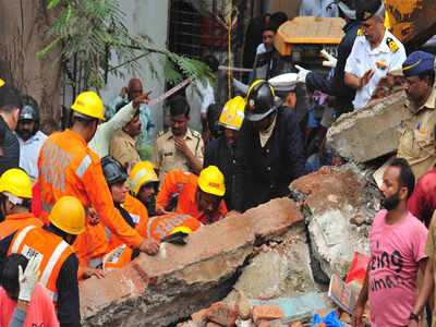 Building Collapse In Ghatkopar Ganpati Frame Saves Mother And