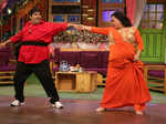 Kiku Sharda and Bharti Singh performing an act