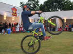A youngster performs cycle stunts