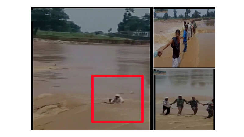 Watch: Locals, policemen form human chain to rescue drowning man