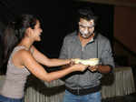 Anya Singh putting cake on Aadar Jain's face