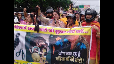 Kanpur women wear helmets to protest against braid cutting incidents