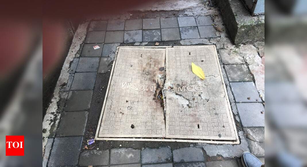 safety hazard for footpath walkers Times of India