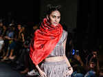 ​ A model sashays down the ramp for designer Nakita Singh