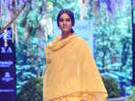 A model walks the ramp for designer Rahul Mishra