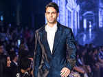 A model walks the ramp for designer Manish Malhotra