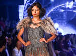 A model showcases a creation by designer Manish Malhotra