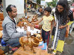 A man sells wooden bullocks