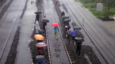 Rains paralyse Mumbai, train services suspended