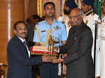 President Ram Nath Kovind presents the Dronacharya Award