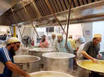 Volunteers from Indian Dawoodi Bohra community prepare food