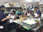Volunteers from Indian community prepare food