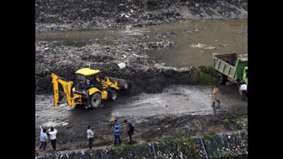 Two killed as 50 tonnes of waste hurtles down Ghazipur landfill