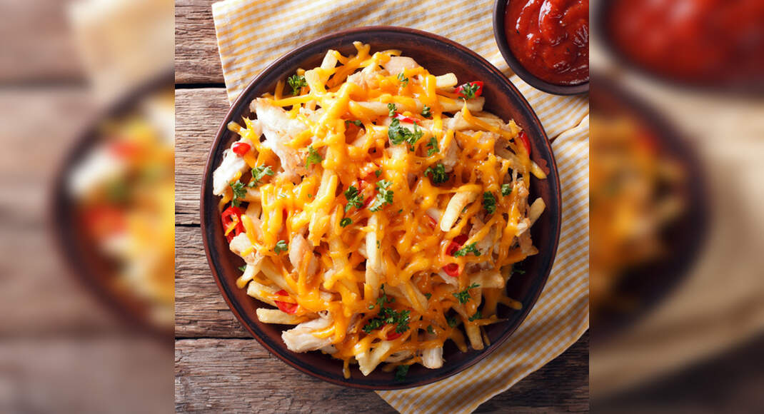 Baked Cheesy French Fries Recipe: How to Make Baked Cheesy French Fries Recipe | Homemade Baked Chee