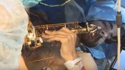 Patient plays saxophone while surgeons remove brain tumour