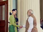 Narendra Modi greets Aung San Suu Kyi