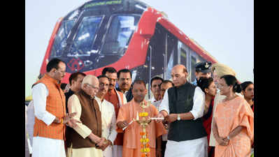 Metro makes maiden run, Rajnath Singh, Yogi Adityanath take first ride