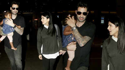 Sunny Leone, Daniel Weber spotted with daughter Nisha at the airport