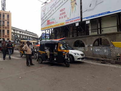 traffic police seated in auto near Rly station on