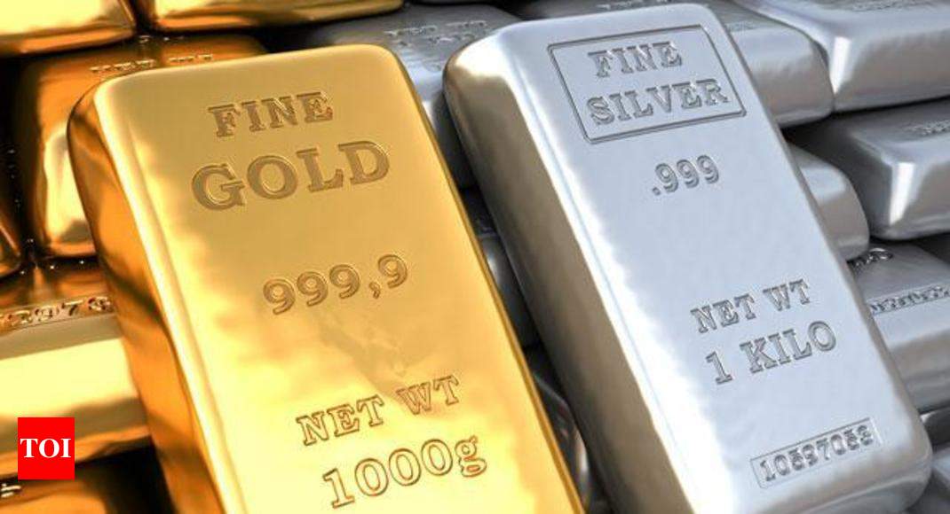 How much one ounce gold weights? - Times of India