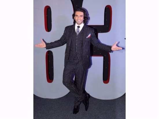 Ranveer Singh proves that all you men need to own a pin-striped suit STAT