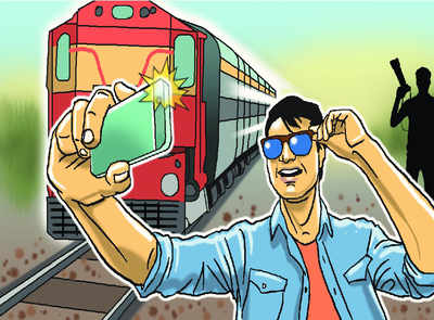 Boy seen taking selfie run over by train | Delhi News - Times of India