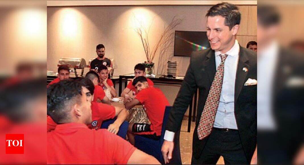 Football fan diplomat feels at home among Chile colts during dinner ...