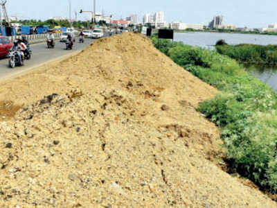 PWD dumps waste, sand along marsh