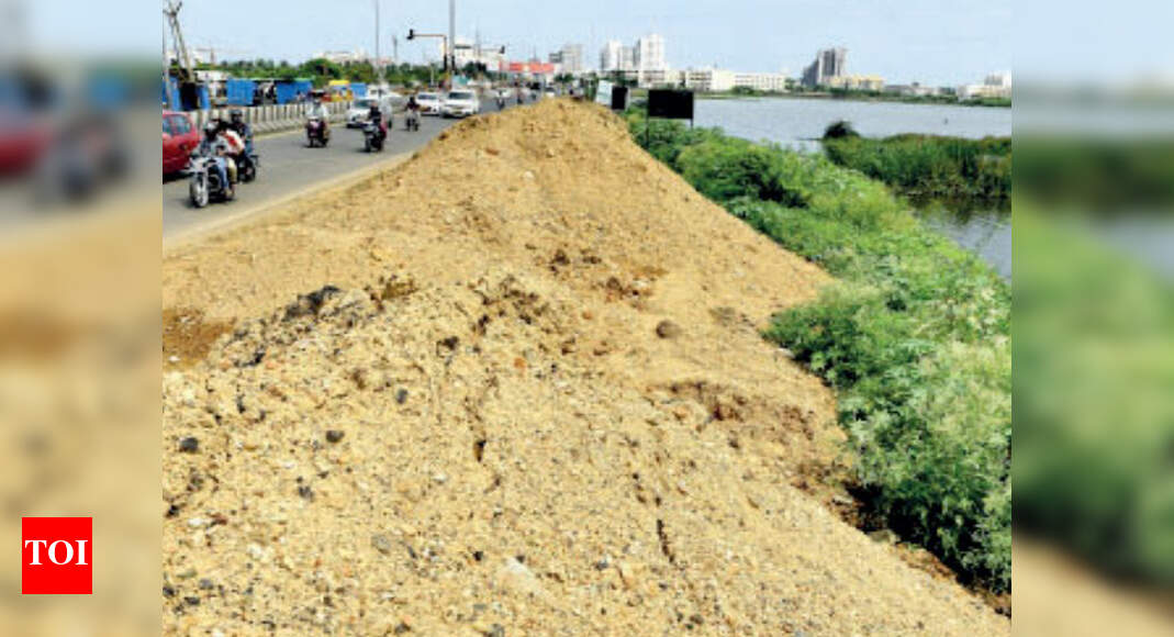 PWD dumps waste, sand along marsh Chennai News Times of India