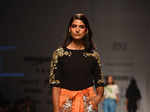 ​ A model walks the ramp