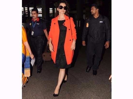 Kangana Ranaut shows us just how to work a trench coat in glam style!