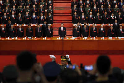 China enshrines Xi thought in party statute, elevates him to Mao’s status