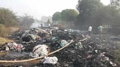 Fire put off, but no check on waste-dumping in new sector