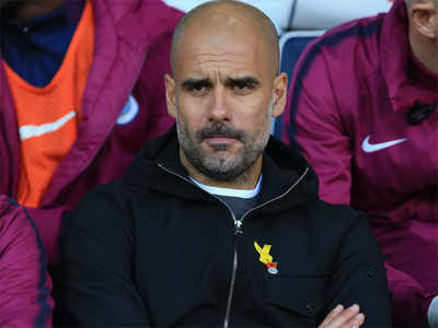 Guardiola encouraged as Man City maintain lead