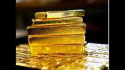 1kg gold at Amritsar airport, 2 held
