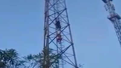 Canadian girls scale mobile tower, create stir at Dewas' hill temple