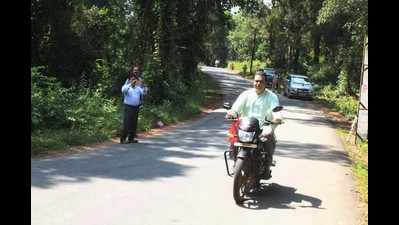 Minister Pramod Madhwaraj pays Rs 100 as fine for helmetless riding