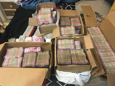 I-T dept seizes Rs.11 crore cash in raids related to NSE co-location case