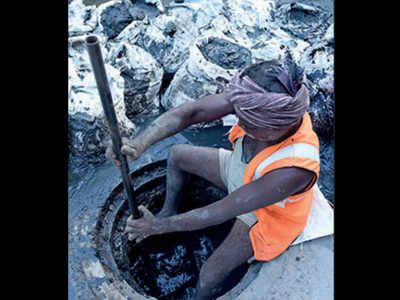 Workers hired by civic body found cleaning manhole