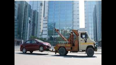 Before towing vehicle, announce it on megaphone, mandate new rules