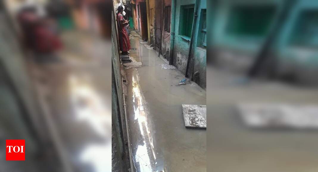 slums filled with gutter water - Times of India