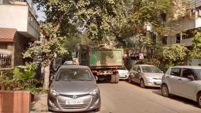 Garbage being taken in uncovered EDMC truck
