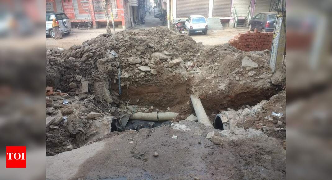 Road dug up for sewer line left unattended Times of India