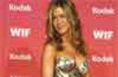 Aniston goes topless for new perfume