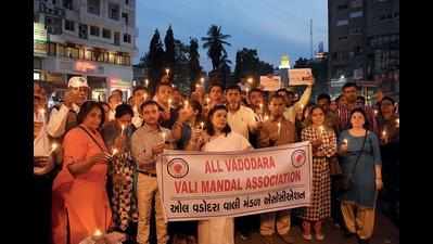 Aggrieved parents take out candle march in city