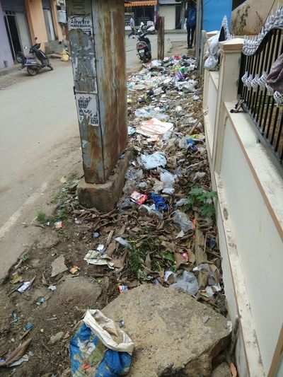 dumped garbage in road entrance