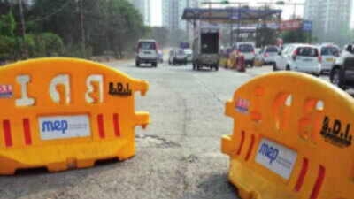 Pothole claims another life: Mulund doctor run over by truck